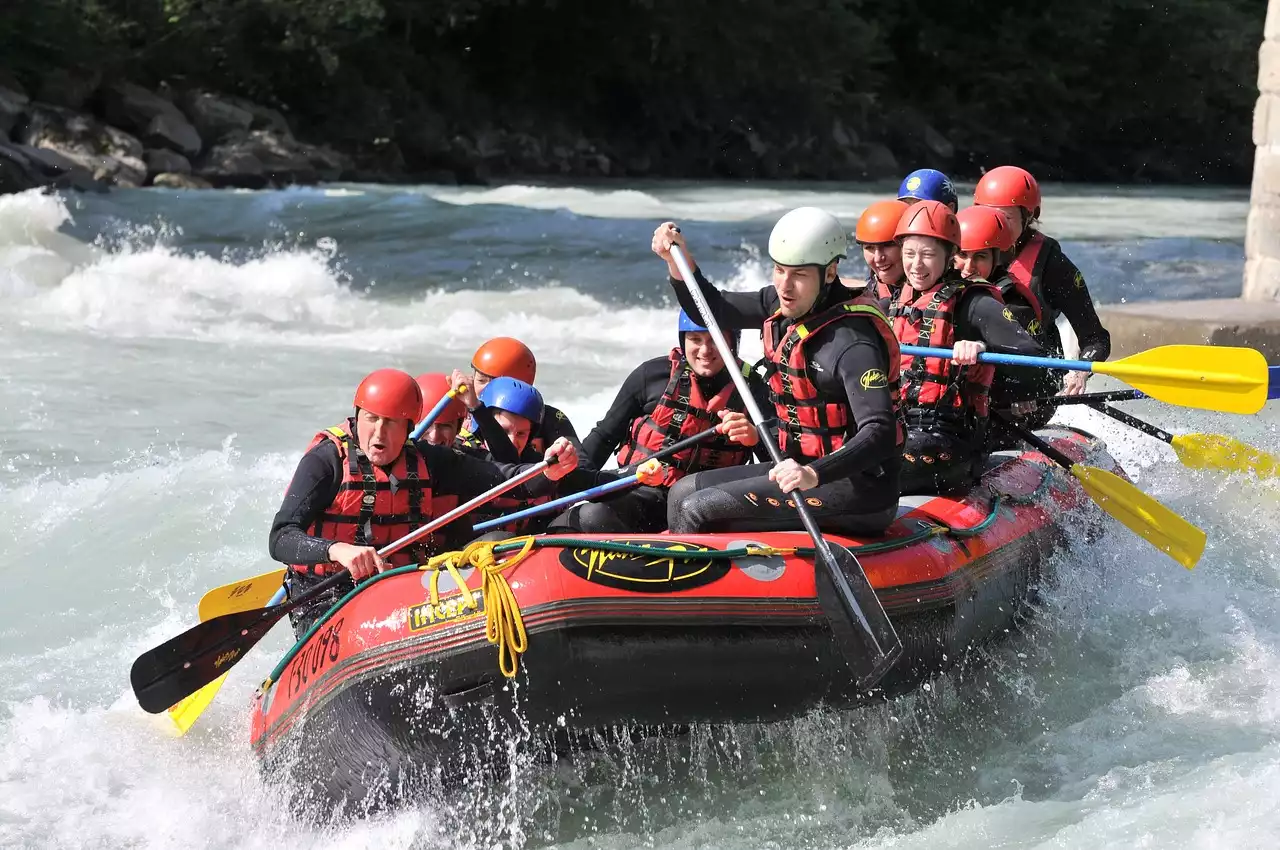 Navigating the Rapids: The Benefits and Drawbacks of Booking a Guided Rafting Tour